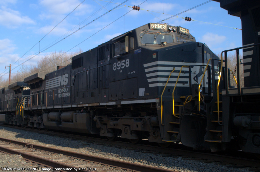 NS C44-9W 8958 trails on B100-18
